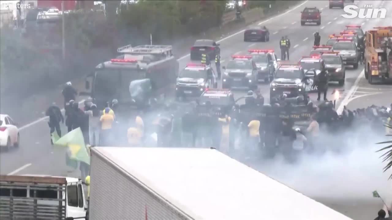 Brazilian police fire water cannons and rubber bullets at anti Lula protesters