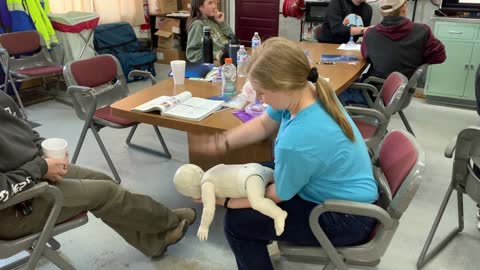 Conscious, Choking Infant