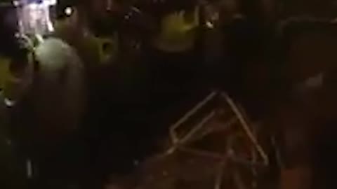 Tensions in London as protesters tear down anti-protest barricade