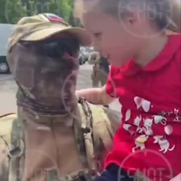 A girl and a Russian soldier in the Kherson region