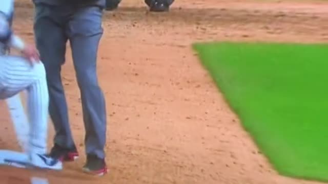 Aaron Boone is pumped up after the New York Yankees turn the double play in the 8th inning