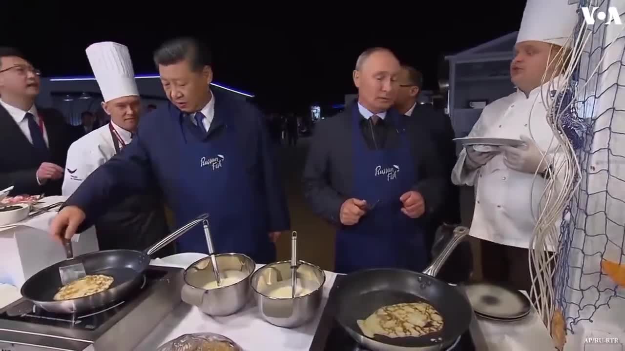 Putin and China's President Xi Drinking Vodka & Making Pancakes As A Warning In Resurfaced Video?