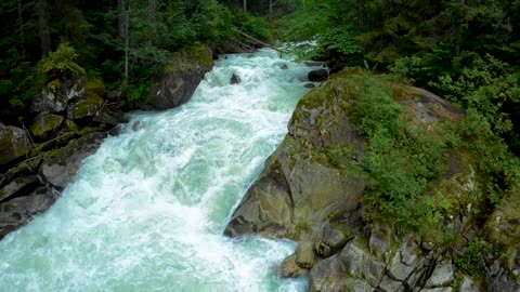 Flow of river in village area