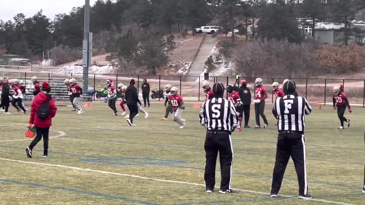 The 49ers Warm Up in the Snow at the United States Air Force Academy