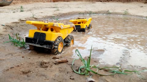 Mahindra Tractor Stuck in mud and pulling by john deer tractor Double E, Excavator