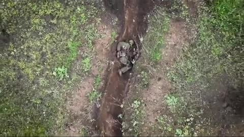 Russian soldier catches 2 bombs dropped by a Ukrainian drone and throws