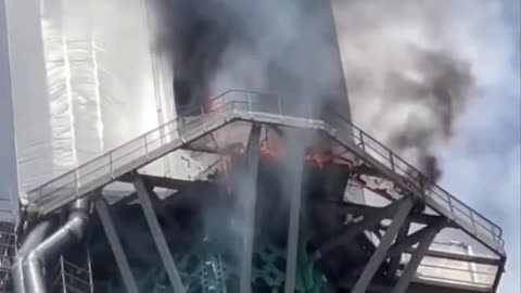 Spire Of Famous French Cathedral On Fire