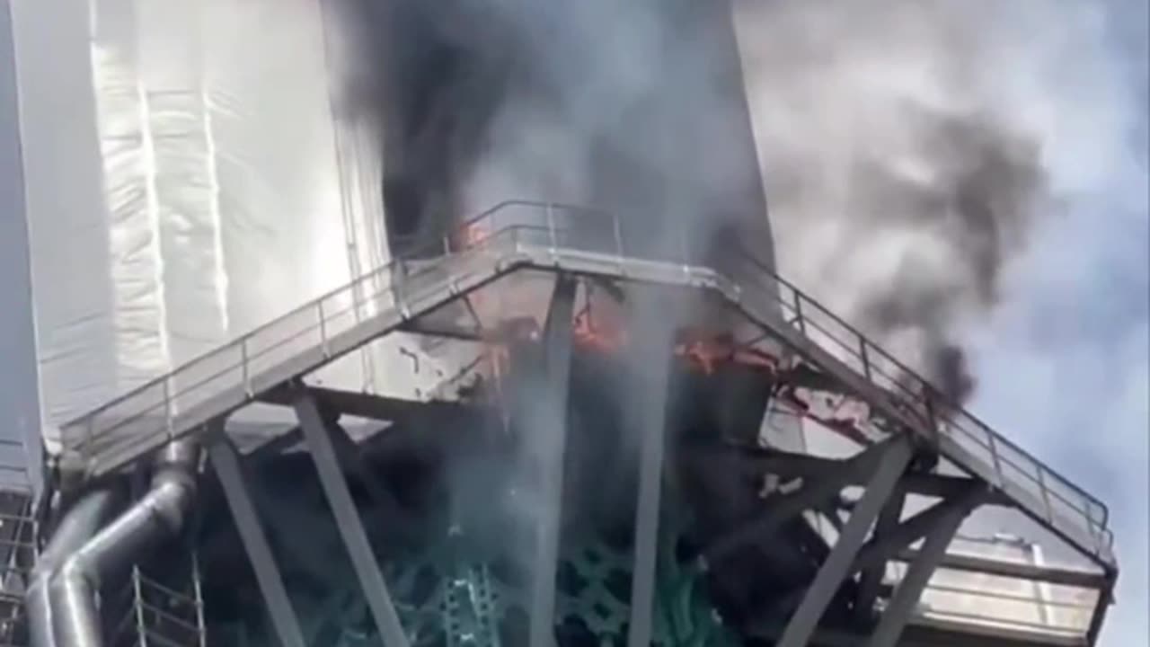 Spire Of Famous French Cathedral On Fire