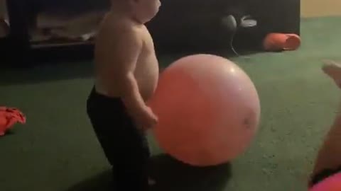 Kid Lands Headfirst on Toy Ball