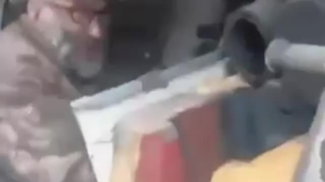 ELDERLY UKRAINIAN TANK GUNNER
