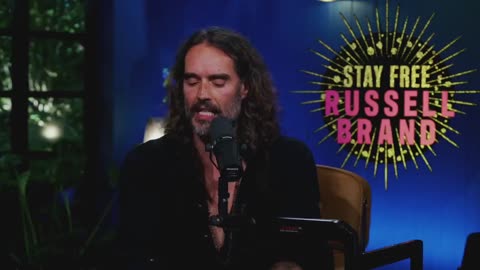Russell Brand inquires about Tucker Carlson's dismissal from FOX