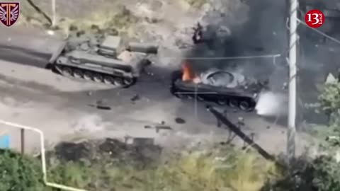 Coming to the rescue of a hit Russian tank, military equipment itself comes under artillery fire