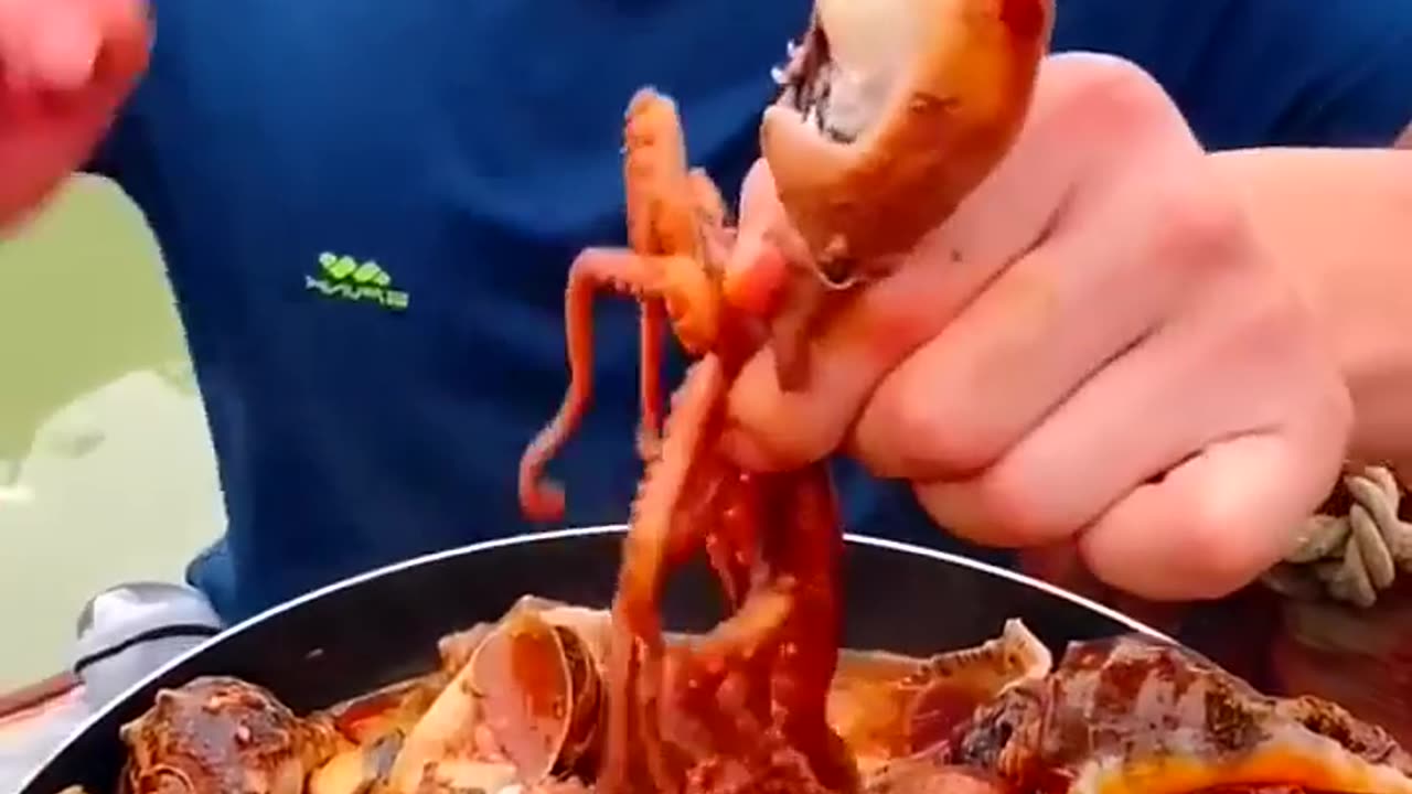Chinese fisherman cooking and Eating fresh seafood...