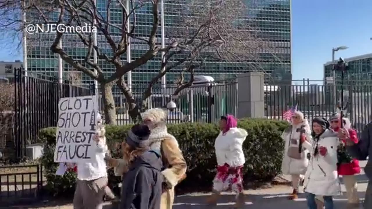 Protesters hit Pfizer World Headquarters today, before marching to the United Nations. Chants of “Nuremberg!” then placing white flowers outside the UN.