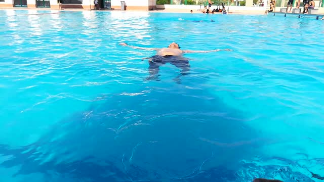 Swimmer Knows How To Hold Breath In Pool Floating Skills