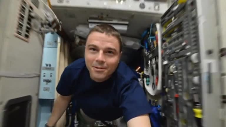 Astronaut offers floating peek inside International Space Station