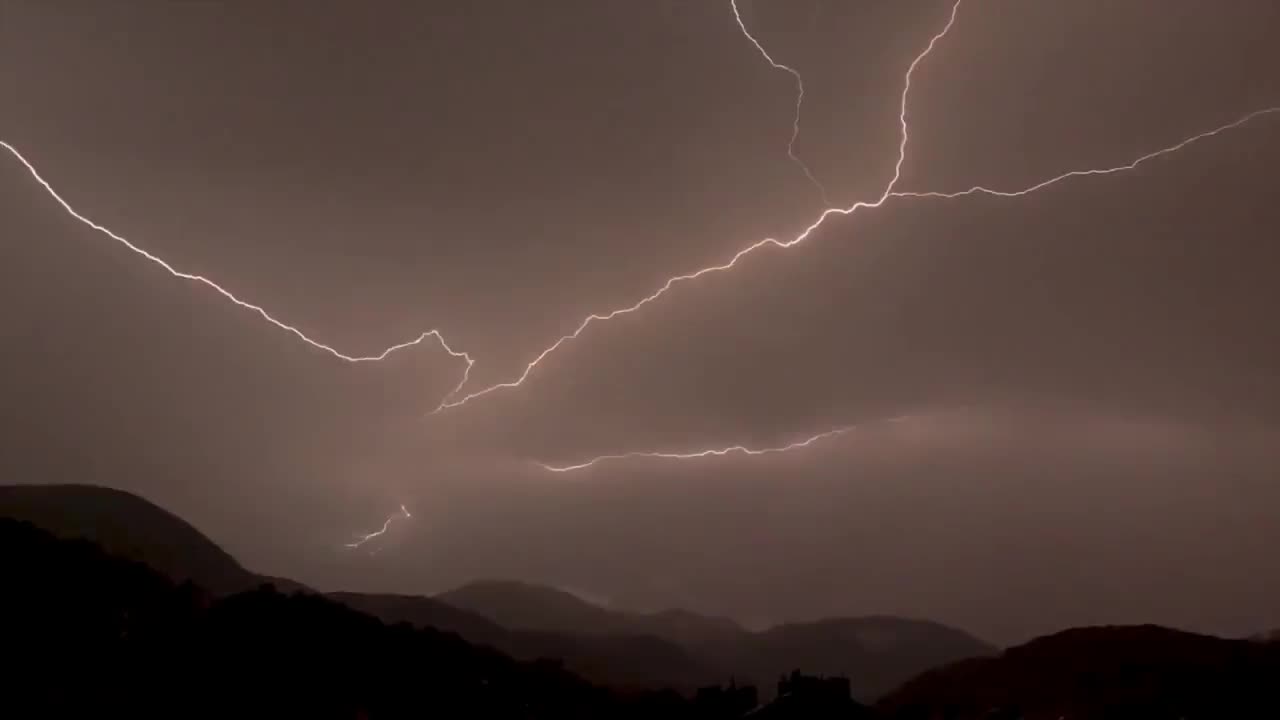 The magic of nature, thunder and lightning, illuminate the silent night