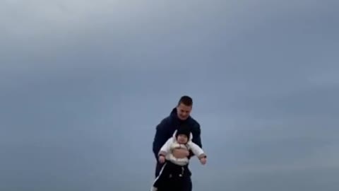 Father Flips Toddler in Air and Catches Her Back