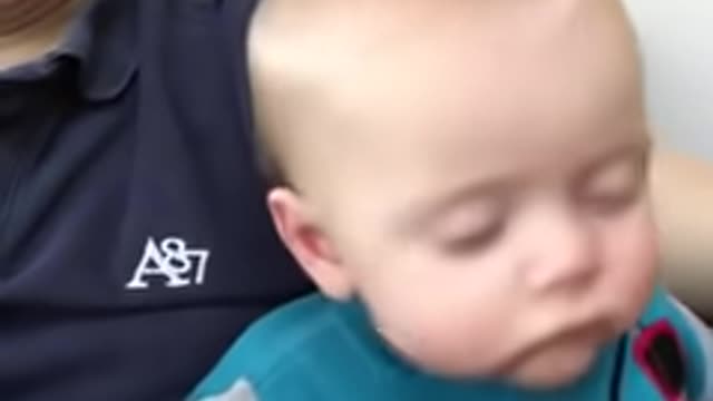 Dad Puts Baby to Sleep by Sliding Hand on Face