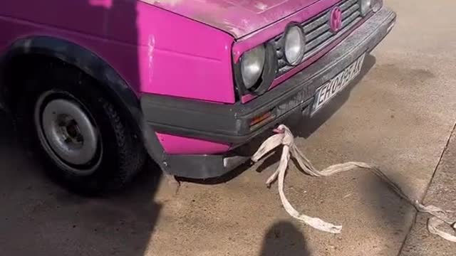 Cleaning an old car that has been in the warehouse for a long time