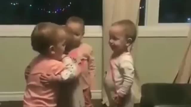 "Aww! These two little babes are hugging and it's super adorable!"