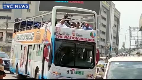 (EXCLUSIVE) Tinubu Drives Round Lagos In Campaign Truck, Waves At Residents