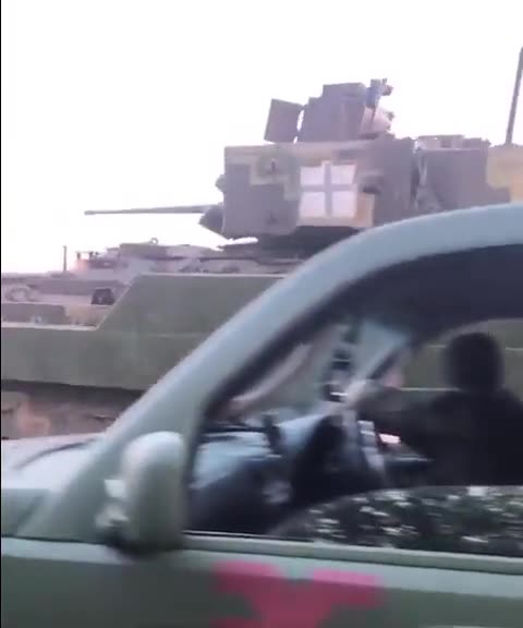 Ukrainian Bradley Driving Around the Front