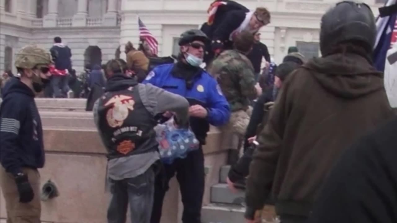 Cops handing out refreshments to "insurrectionists"**