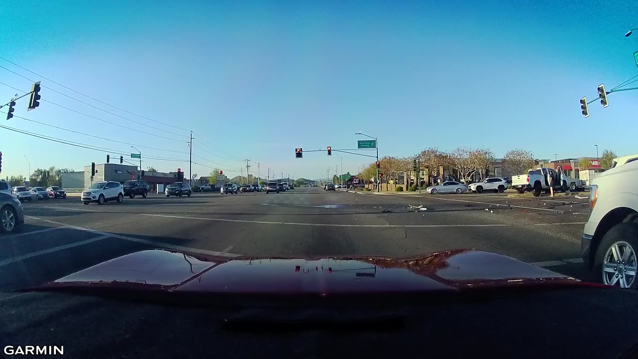 Three Car Wreck at Busy Intersection