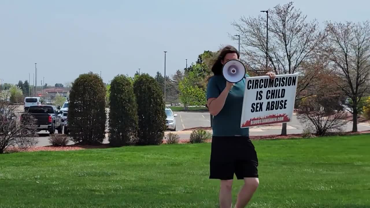 An Intactivist Demonstration at the Corner of Division and South Airport