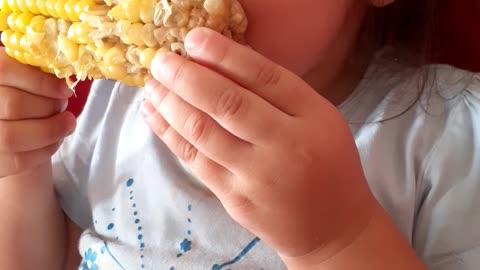 Watch her reaction! First time eating corn ever😮😯