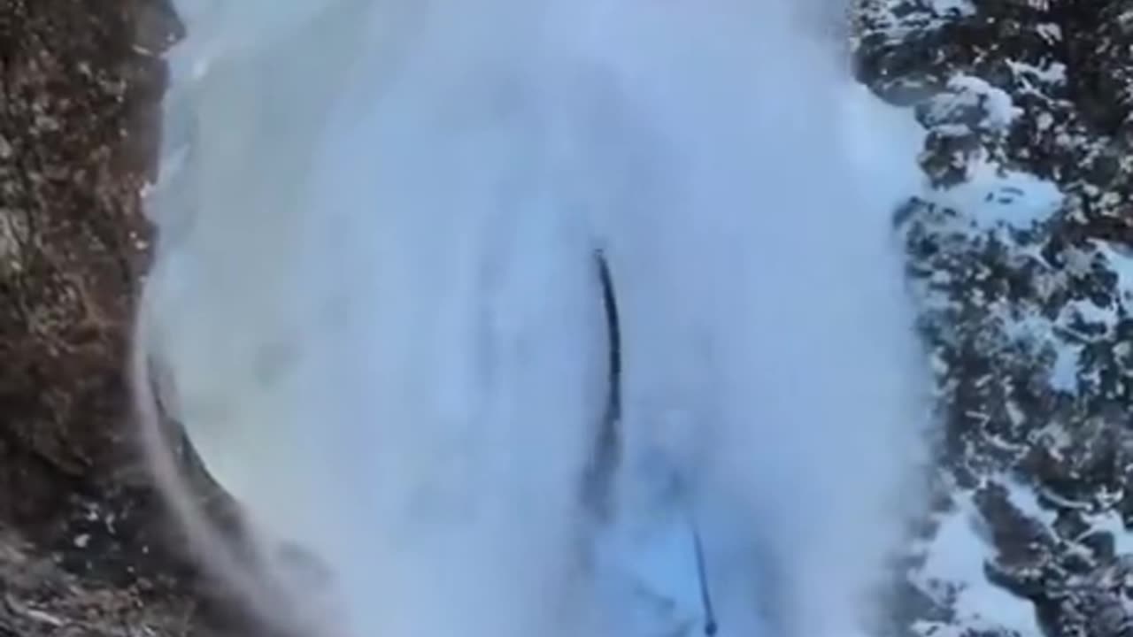 Man holds on tight through an avalanche