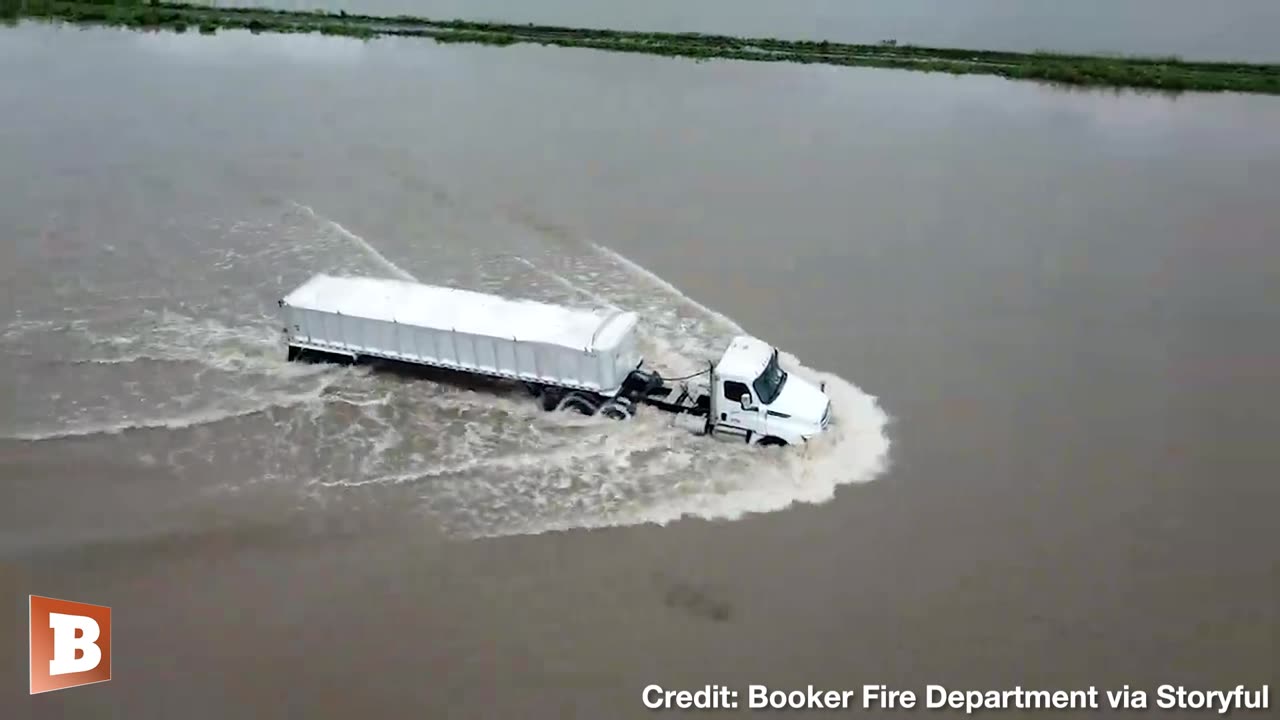 HAMMER DOWN! Semi-Truck PLOWS THROUGH Floodwaters in Booker, TX