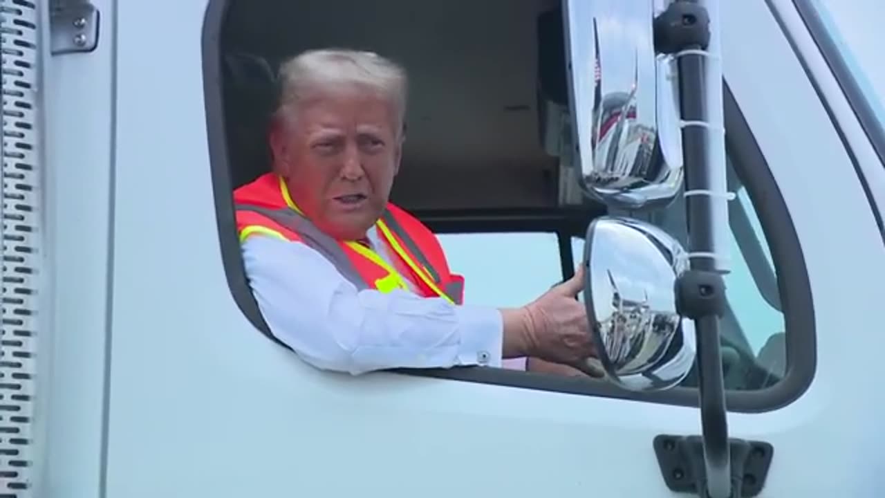 Donald Trump speaks to reporters from a garbage truck on campaign trail in Green Bay, Wisconsin - October 30, 2024