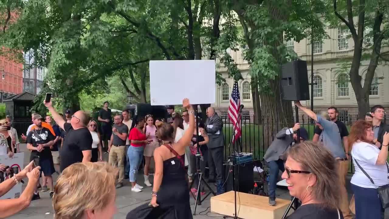 Dancing at anti-vaccine rally nyc