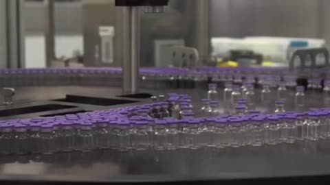 Watch a Pfizer COVID-19 vaccine production line