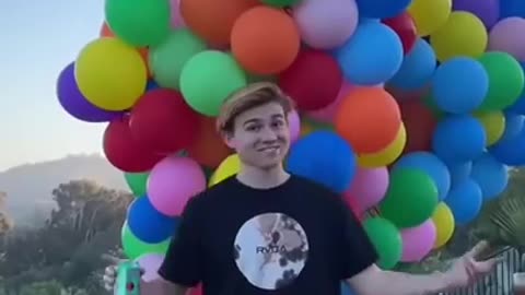 I attached a bunch of balloons onto myself to see if I could float! 👀😱 #shorts