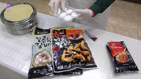 Process of making dumplings by 170 employees. South Korean dumpling factory