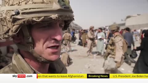 Desperation, as thousands queue next to Kabul airport