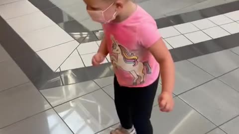 Little Girl Conquers Her Fear of Floor Tiles