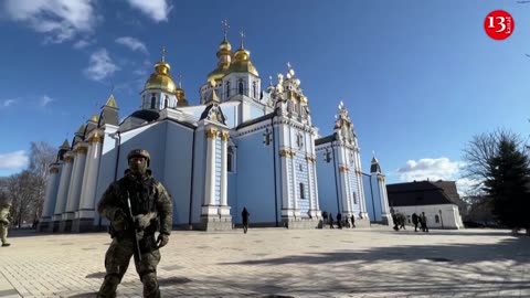 U.S. Biden and Ukraine's Zelenskiy commemorate killed soldiers as air raid siren wails