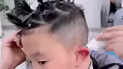 This kid cuts his own hair!