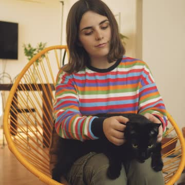 Woman petting a cat