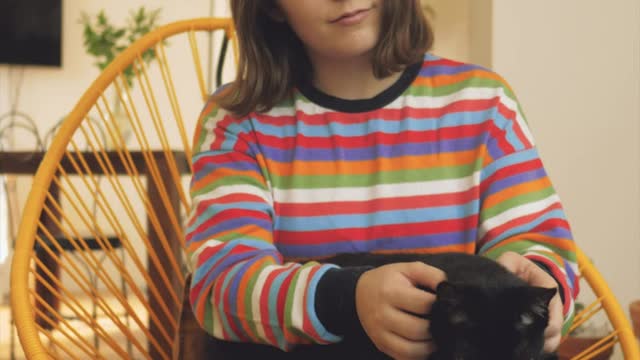 Woman petting a cat