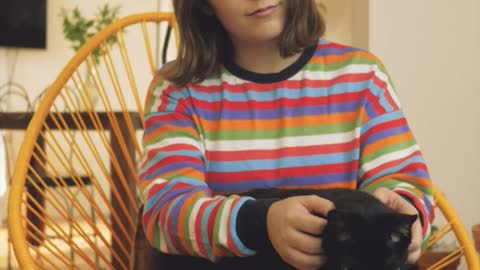 Woman petting a cat