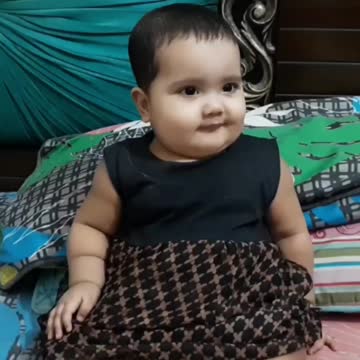 Cute baby playing with their family