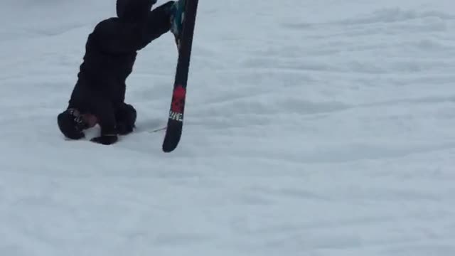 Man in black back flip lands on head