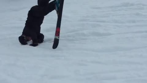 Man in black back flip lands on head