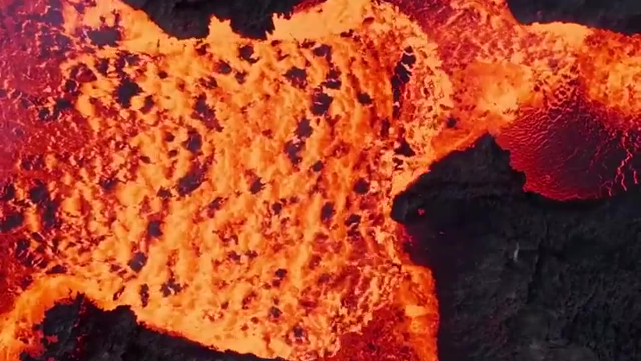 drone footage captures a lava flow during a volcanic eruption on Iceland’s Reykjanes