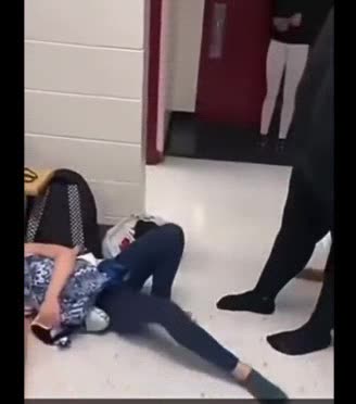 Young student get a "Smackdown" hitting her head on wall & bench.